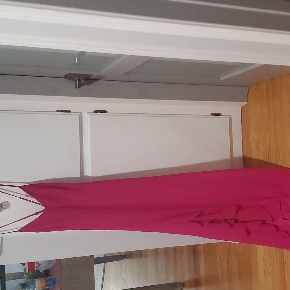 Magenta Lulu's dress with Ruffled slit. Perfect for a formal or casual event.